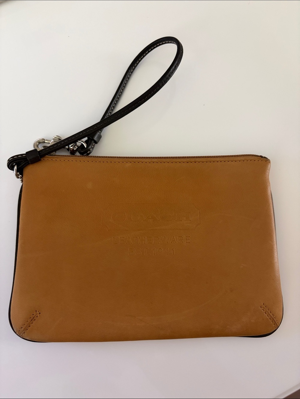 Coach Women’s Tan Leather Wristlet with Black Strap